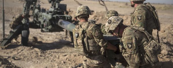 This June 10, 2017 photo provided by Operation Resolute Support, U.S. Soldiers with Task Force Iron maneuver an M-777 howitzer, so it can be towed into position at Bost Airfield, Afghanistan This June 10, 2017 photo provided by Operation Resolute Support, U.S. Soldiers with Task Force Iron maneuver an M-777 howitzer, so it can be towed into position at Bost Airfield, Afghanistan - Sputnik International