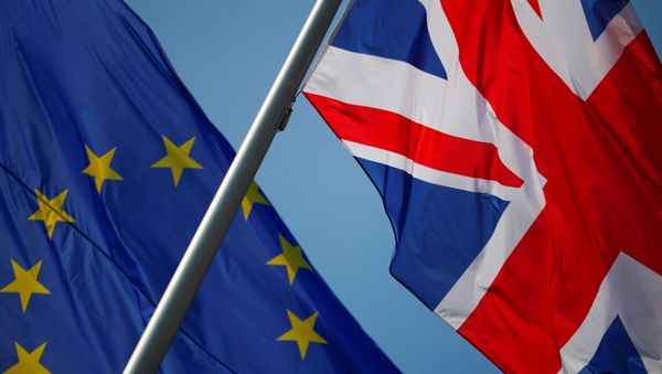 European Union and British flags flutter in front of a chancellery ahead of a visit of British Prime Minister Theresa May in Berlin, Germany, April 9, 2019 - Sputnik International
