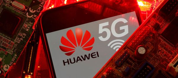 A smartphone with the Huawei and 5G network logo is seen on a PC motherboard in this illustration picture taken January 29, 2020 A smartphone with the Huawei and 5G network logo is seen on a PC motherboard in this illustration picture taken January 29, 2020 - Sputnik International