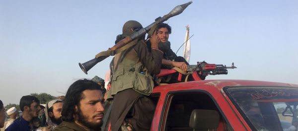 Taliban fighters ride in their vehicle in Surkhroad district of Nangarhar province, east of Kabul, Afghanistan, Saturday, June 16, 2018 - Sputnik International