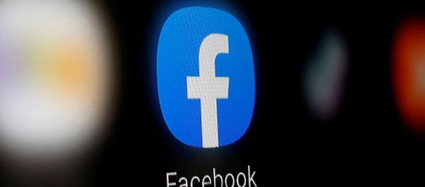 A Facebook logo is displayed on a smartphone in this illustration taken 6 January 2020. - Sputnik International