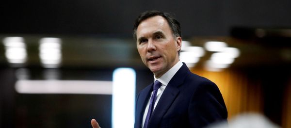 Canada's Minister of Finance Bill Morneau speaks in the House of Commons as legislators convene to give the government power to inject billions of dollars in emergency cash to help individuals and businesses through the economic crunch caused by the coronavirus disease (COVID-19) outbreak, on Parliament Hill in Ottawa, Ontario, Canada April 11, 2020. Canada's Minister of Finance Bill Morneau speaks in the House of Commons as legislators convene to give the government power to inject billions of dollars in emergency cash to help individuals and businesses through the economic crunch caused by the coronavirus disease (COVID-19) outbreak, on Parliament Hill in Ottawa, Ontario, Canada April 11, 2020. - Sputnik International