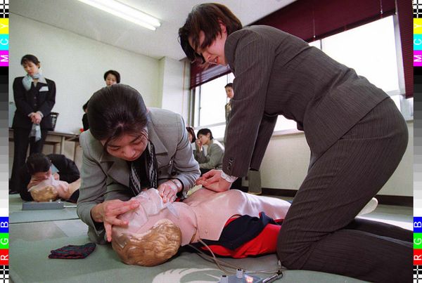 Flight attendant recruits for Japan Airlines practice artificial respiration on dolls during an induction course at the firm's training centre in Tokyo 14 April Flight attendant recruits for Japan Airlines practice artificial respiration on dolls during an induction course at the firm's training centre in Tokyo 14 April - Sputnik International