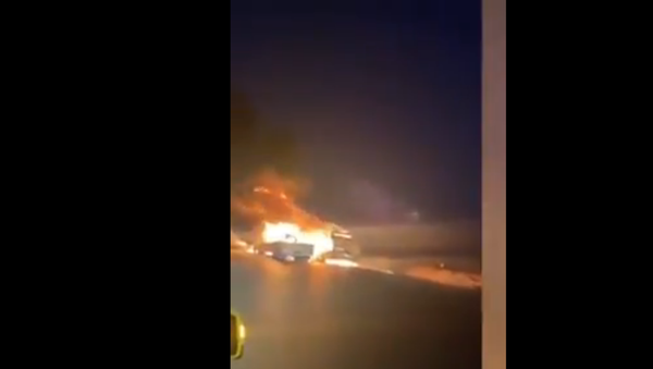 Flame Allegedly Consuming US trucks in Iraq Flame Allegedly Consuming US trucks in Iraq - Sputnik International