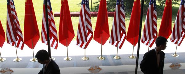 Chinese and US national flags are posted for the opening ceremony of the U.S.- China Strategic and Economic Dialogue at The Diaoyutai state guesthouse in Beijing Thursday, May 3, 2012 Chinese and US national flags are posted for the opening ceremony of the U.S.- China Strategic and Economic Dialogue at The Diaoyutai state guesthouse in Beijing Thursday, May 3, 2012 - Sputnik International
