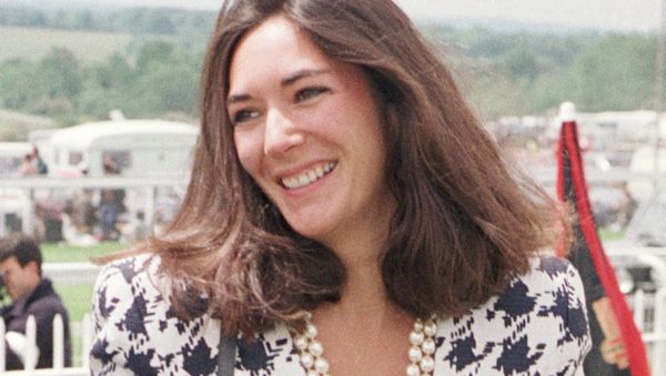 In this June 5, 1991 file photo, British socialite Ghislaine Maxwell arrives at Epsom Racecourse. The FBI said Thursday July 2, 2020, Ghislaine Maxwell, who was accused by many women of helping procure underage sex partners for Jeffrey Epstein, has been arrested in New Hampshire. - Sputnik International