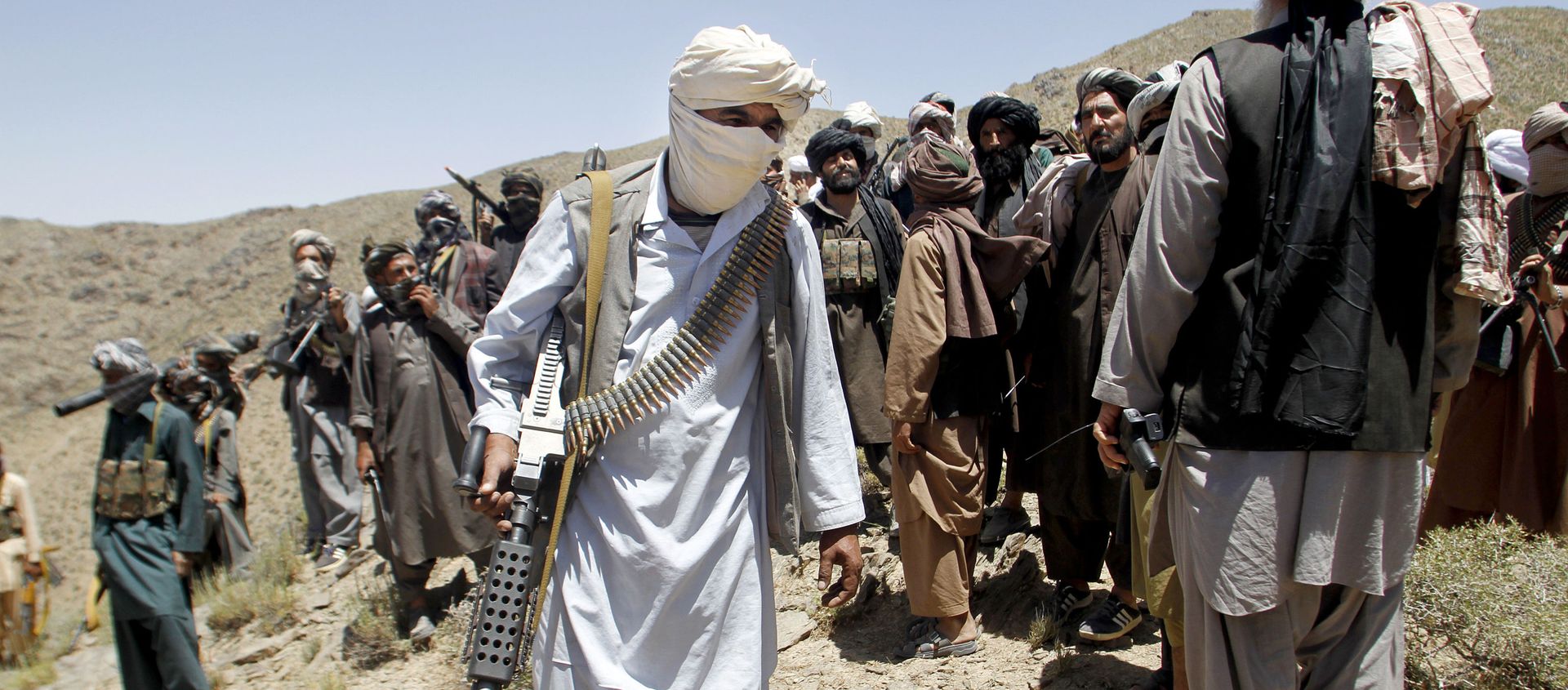 In this Friday, May 27, 2016 photo, members of a breakaway faction of the Taliban fighters walks during a gathering, in Shindand district of Herat province, Afghanistan - Sputnik International, 1920, 07.08.2021