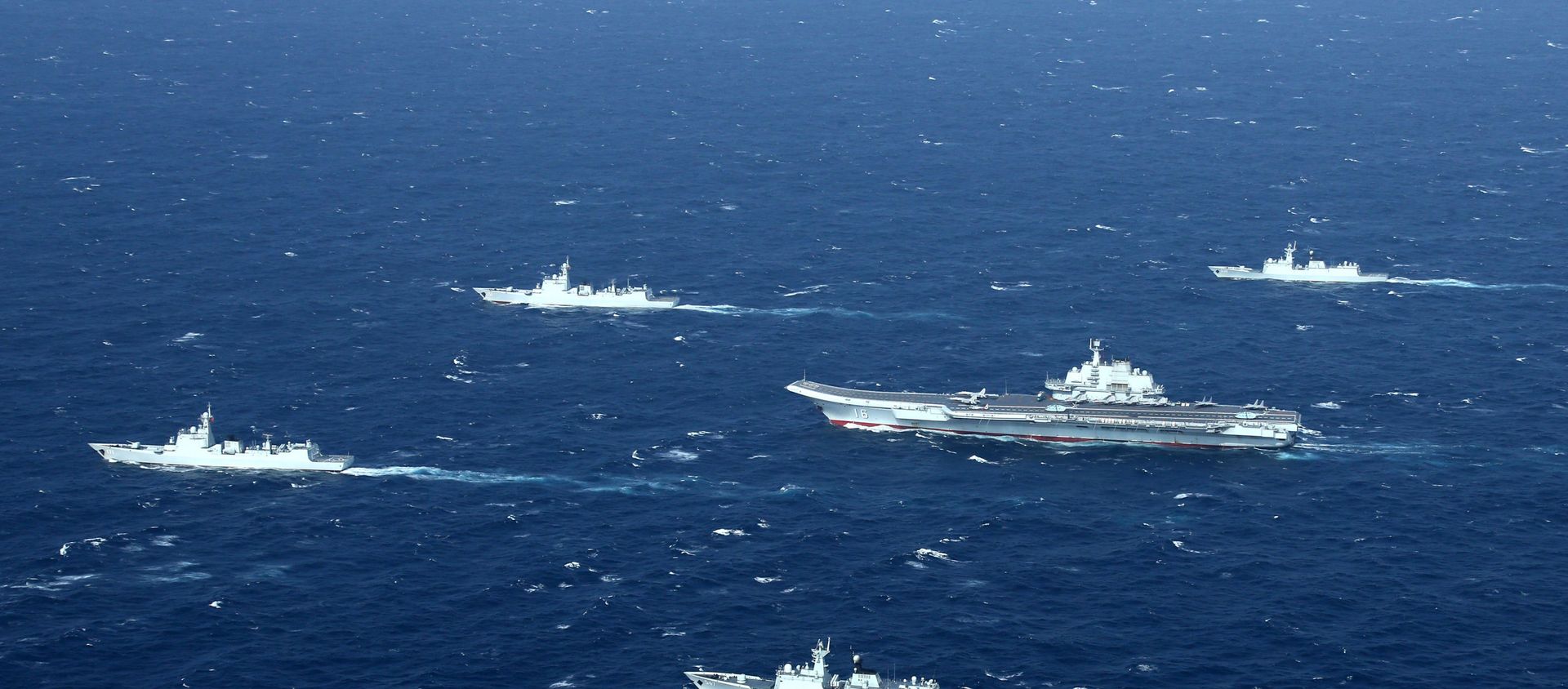 This aerial file photo taken on January 2, 2017 shows a Chinese Navy formation, including the aircraft carrier Liaoning (C), during military drills in the South China Sea. This aerial file photo taken on January 2, 2017 shows a Chinese Navy formation, including the aircraft carrier Liaoning (C), during military drills in the South China Sea. - Sputnik International, 1920, 14.07.2020