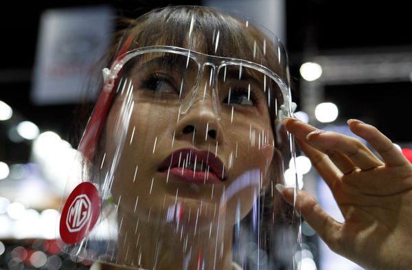A model is pictured during the media day of the 41st Bangkok International Motor Show after the Thai government eased measures to prevent the spread of the coronavirus disease (COVID-19) in Bangkok, Thailand July 14, 2020. A model is pictured during the media day of the 41st Bangkok International Motor Show after the Thai government eased measures to prevent the spread of the coronavirus disease (COVID-19) in Bangkok, Thailand July 14, 2020. - Sputnik International