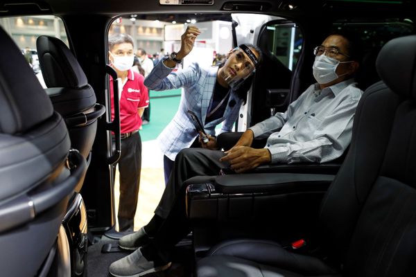 A customer sits inside a Lexus LM 300h during the media day of the 41st Bangkok International Motor Show after the Thai government eased measures to prevent the spread of the coronavirus disease (COVID-19) in Bangkok, Thailand July 14, 2020. A customer sits inside a Lexus LM 300h during the media day of the 41st Bangkok International Motor Show after the Thai government eased measures to prevent the spread of the coronavirus disease (COVID-19) in Bangkok, Thailand July 14, 2020. - Sputnik International