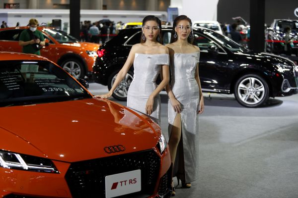 Models wearing face shields pose with an Audi TT RS Coupe during the media day of the 41st Bangkok International Motor Show after the Thai government eased measures to prevent the spread of the coronavirus disease (COVID-19) in Bangkok, Thailand July 14, 2020. Models wearing face shields pose with an Audi TT RS Coupe during the media day of the 41st Bangkok International Motor Show after the Thai government eased measures to prevent the spread of the coronavirus disease (COVID-19) in Bangkok, Thailand July 14, 2020. - Sputnik International