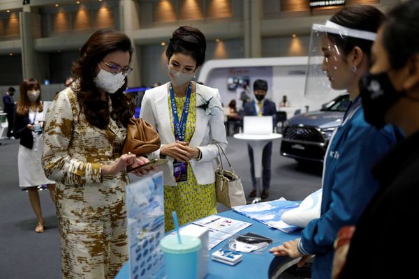 Customers are seen during the media day of the 41st Bangkok International Motor Show after the Thai government eased measures to prevent the spread of the coronavirus disease (COVID-19) in Bangkok, Thailand July 14, 2020. Customers are seen during the media day of the 41st Bangkok International Motor Show after the Thai government eased measures to prevent the spread of the coronavirus disease (COVID-19) in Bangkok, Thailand July 14, 2020. - Sputnik International