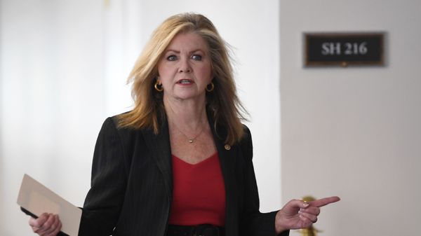 Sen. Marsha Blackburn, R-Tenn., heads into a Republican policy lunch on Capitol Hill in Washington, Thursday, March 19, 2020. - Sputnik International