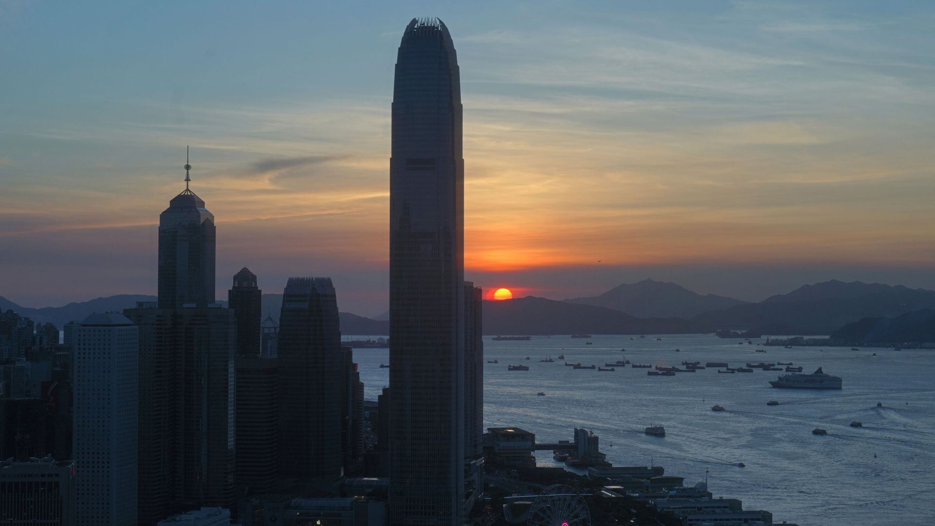 The skyline of the business district is silhouetted at sunset in Hong Kong Monday, 13 July 2020. The skyline of the business district is silhouetted at sunset in Hong Kong Monday, 13 July 2020. - Sputnik International, 1920, 11.03.2021