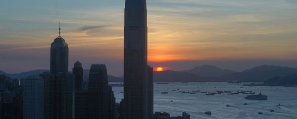 The skyline of the business district is silhouetted at sunset in Hong Kong Monday, July 13, 2020 The skyline of the business district is silhouetted at sunset in Hong Kong Monday, July 13, 2020 - Sputnik International