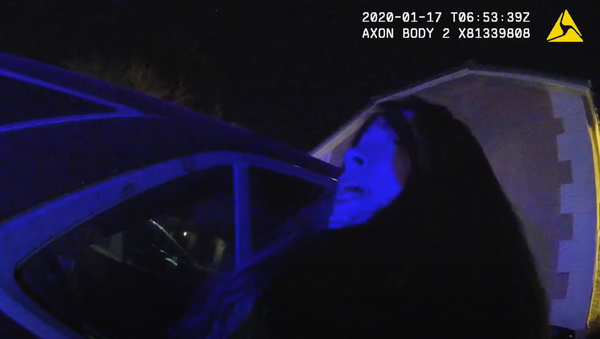 Mariah Valenzuela, 23, says Phoenix Police Officer Michael McGillis manhandled and assaulted her during a January 15, 2020, arrest. She intends to sue the city of Phoenix and the Maricopa County Attorney's Office.  - Sputnik International