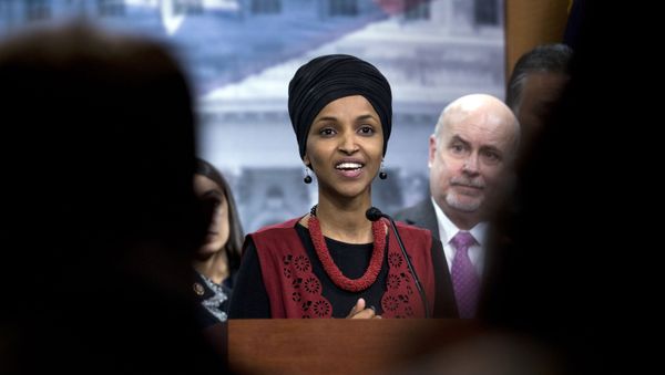 Congressional Progressive Caucus members Rep. Ilhan Omar, D-Minn., accompanied by Rep. Mark Pocan, D-Wis., and other members of the Caucus, speaks during a news conference on last week's targeted killing of Iran's senior military commander Gen. Qassem Soleimani on Capitol Hill, in Washington, Wednesday, Jan. 8, 2020. - Sputnik International