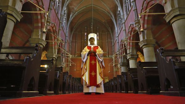 Rev. Shahid Mehraj leads a Easter Mass live-streamed from Cathedral Church of the Resurrection due to a government-imposed lockdown to help stop the spread of the new coronavirus, in Lahore, Pakistan, Sunday, April 12, 2020 - Sputnik International