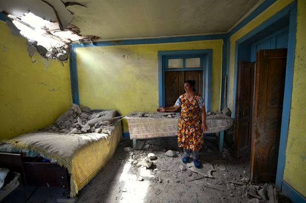A local woman shows damage in her house after shelling by Armenian forces in the Tovuz region of Azerbaijan, Tuesday, July 14, 2020 - Sputnik International