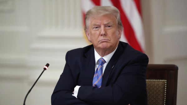 President Donald Trump listens during a National Dialogue on Safely Reopening America's Schools, event in the East Room of the White House, Tuesday, July 7, 2020, in Washington - Sputnik International