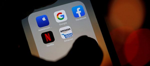 The logos of mobile apps, Google, Amazon, Facebook, Apple and Netflix, are displayed on a screen in this illustration picture taken 3 December 2019. The logos of mobile apps, Google, Amazon, Facebook, Apple and Netflix, are displayed on a screen in this illustration picture taken 3 December 2019. - Sputnik International