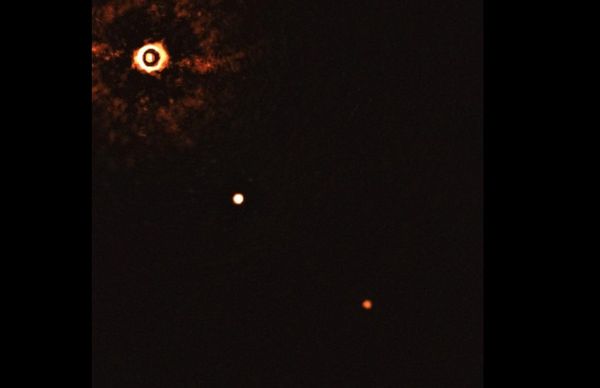 Astronomers Unveil First Photo of Sun-Like Star Orbited by Pair of Exoplanets Astronomers Unveil First Photo of Sun-Like Star Orbited by Pair of Exoplanets - Sputnik International