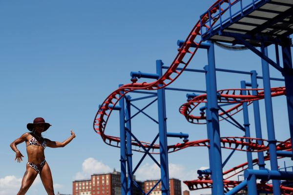 A woman dances during a video shoot at Coney Island in the Brooklyn borough of New York, US, July 21, 2020 A woman dances during a video shoot at Coney Island in the Brooklyn borough of New York, US, July 21, 2020 - Sputnik International