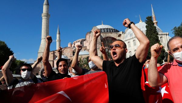 People gather in front of the Hagia Sophia or Ayasofya, after a court decision that paves the way for it to be converted from a museum back into a mosque, in Istanbul, Turkey, July 10, 2020 - Sputnik International