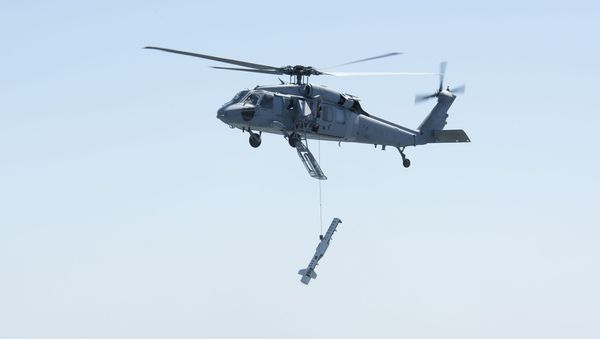 Naval Air Station Patuxent River Air Test and Evaluation Squadron TWO ONE (HX-21) conducted Airborne Mine Neutralization System (AMNS) AN/ASQ-235 training flights with Naval Surface Warfare Center Panama City Division Dragon Masters Aviation Unit March 15-16, 2017. - Sputnik International