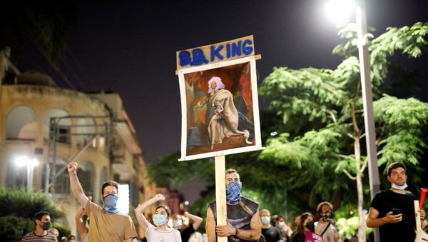 Israelis demonstrate against Prime Minister Benjamin Netanyahu and his government's handling of the coronavirus disease (COVID-19) crisis, on the main boulevard of Tel Aviv, Israel July 18, 2020 Israelis demonstrate against Prime Minister Benjamin Netanyahu and his government's handling of the coronavirus disease (COVID-19) crisis, on the main boulevard of Tel Aviv, Israel July 18, 2020 - Sputnik International