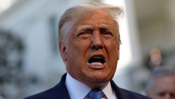 U.S. President Donald Trump speaks to the news media before departing on Marine One for travel to Midland, Texas from the South Lawn of the White House in Washington, U.S., July 29, 2020. - Sputnik International