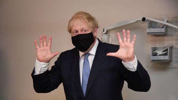Britain's Prime Minister Boris Johnson visits the Tollgate Medical Centre in Beckton, London - Sputnik International