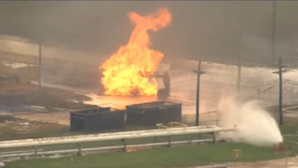 A fire rages following an explosion at the Lone Star natural gas liquids facility in Mont Belvieu, Texas, on July 29, 2020. A fire rages following an explosion at the Lone Star natural gas liquids facility in Mont Belvieu, Texas, on July 29, 2020. - Sputnik International