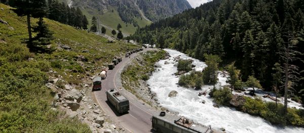 FILE PHOTO: An Indian Army convoy moves along a highway leading to Ladakh, at Gagangeer in Kashmir's Ganderbal district on June 18, 2020. - Sputnik International