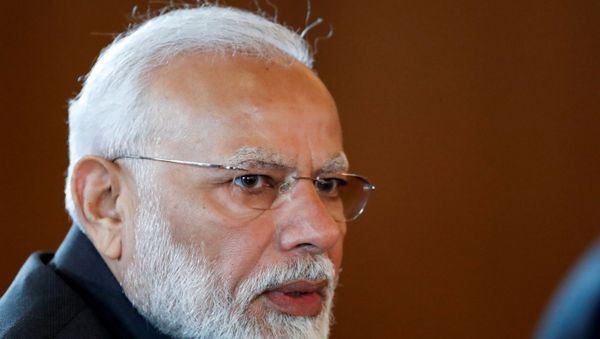 FILE PHOTO: Indian Prime Minister Narendra Modi speaks to Russian President Vladimir Putin during their meeting on the sideline of the 11th edition of the BRICS Summit, in Brasilia, Brazil November 13, 2019.  - Sputnik International