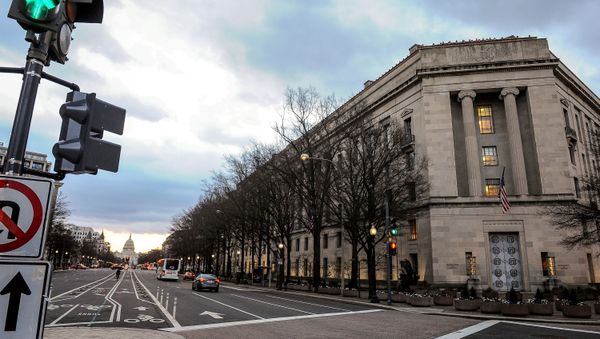 The U.S. Department of Justice building is bathed in morning light at sunrise in Washington, U.S., February 14, 2020.       - Sputnik International