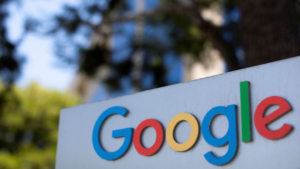 After the company announced it would extend its coronavirus work-from-home order until summer 2021, a  Google sign is shown at one of the company's office complexes in Irvine, California, U.S., July 27, 2020. - Sputnik International