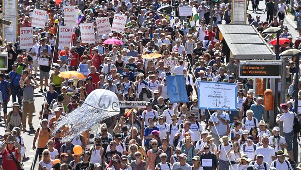 People attend a demonstration initiated by the initiative Querdenken-711 with the slogan the end of the pandemic-the day of freedom to protest against the current measurements to curb the COVID-19 spreading in Berlin, on August 1, 2020. People attend a demonstration initiated by the initiative Querdenken-711 with the slogan the end of the pandemic-the day of freedom to protest against the current measurements to curb the COVID-19 spreading in Berlin, on August 1, 2020. - Sputnik International