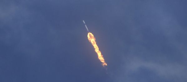 SpaceX Falcon 9 lifts off with NASA astronauts Doug Hurley and Bob Behnken in the Dragon crew capsule, Saturday, May 30, 2020 from the Kennedy Space Center at Cape Canaveral, Fla. The two astronauts are on the SpaceX test flight to the International Space Station. For the first time in nearly a decade, astronauts blasted towards orbit aboard an American rocket from American soil, a first for a private company - Sputnik International