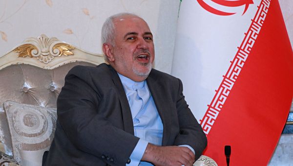 Iranian Foreign Minister Mohammad Javad Zarif meets with his Iraqi counterpart Fouad Hussein, not in photo, in Baghdad, Iraq, Sunday, July 19, 2020. Iranian Foreign Minister Mohammad Javad Zarif meets with his Iraqi counterpart Fouad Hussein, not in photo, in Baghdad, Iraq, Sunday, July 19, 2020. - Sputnik International