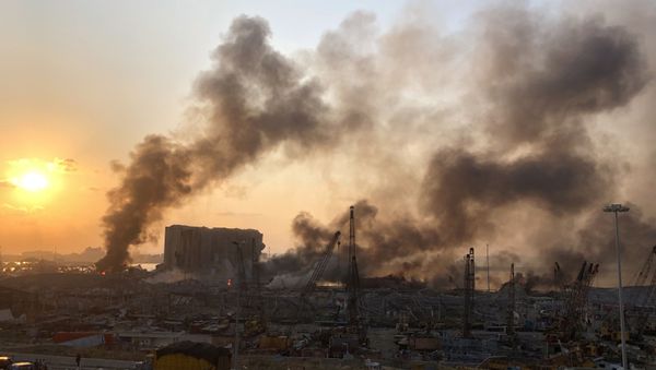 Smoke rises from the site of an explosion in Beirut Smoke rises from the site of an explosion in Beirut - Sputnik International