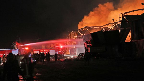 Firefighters douse a blaze at the scene of an explosion at the port of Lebanon's capital Beirut on August 4, 2020 Firefighters douse a blaze at the scene of an explosion at the port of Lebanon's capital Beirut on August 4, 2020 - Sputnik International