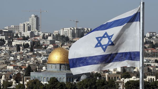 The Israeli flag flutters in front of the Dome of the Rock mosque and the city of Jerusalem, on 1 December 2017.  - Sputnik International