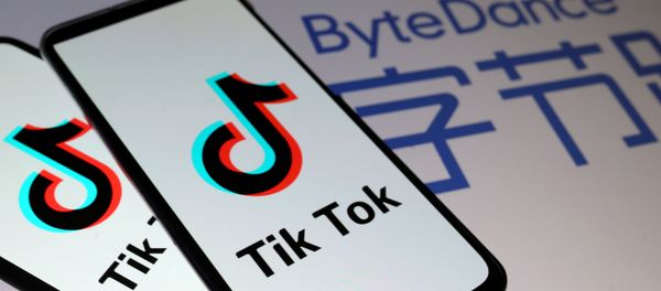 TikTok logos are seen on smartphones in front of a displayed ByteDance logo in this illustration taken November 27, 2019 TikTok logos are seen on smartphones in front of a displayed ByteDance logo in this illustration taken November 27, 2019 - Sputnik International