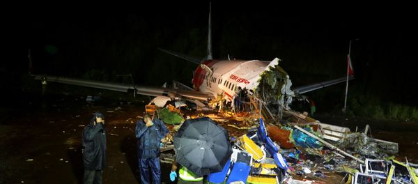 The wreckage from an Air India Express jet in Karipur, Kerala The wreckage from an Air India Express jet in Karipur, Kerala - Sputnik International
