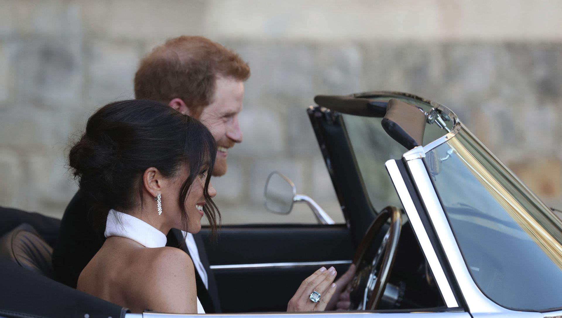 The newly married Duke and Duchess of Sussex, Meghan Markle and Prince Harry, leave Windsor Castle after their wedding to attend an evening reception at Frogmore House, hosted by the Prince of Wales The newly married Duke and Duchess of Sussex, Meghan Markle and Prince Harry, leave Windsor Castle after their wedding to attend an evening reception at Frogmore House, hosted by the Prince of Wales - Sputnik International, 1920, 25.03.2021