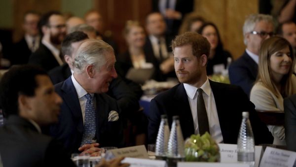Britain's Prince Harry sits with his father Prince Charles, accompanying him to attend a coral reef health and resilience meeting with speeches and a reception with delegates at Fishmongers Hall in London, Wednesday, Feb. 14, 2018 - Sputnik International