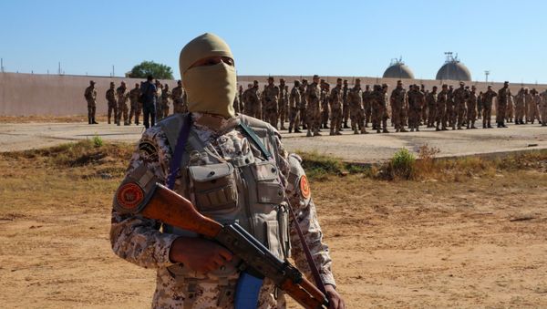 Members of the Petroleum Facilities Guard are seen at the Azzawiya oil refinery, in Zawiyah, west of Tripoli, Libya July 23, 2020. - Sputnik International