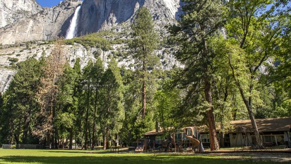 In this May 27, 2020, photo provided by the National Park Service, Yosemite Valley School, lower right, stands in Yosemite National Park, Calif. In the background is Upper Yosemite Falls. - Sputnik International