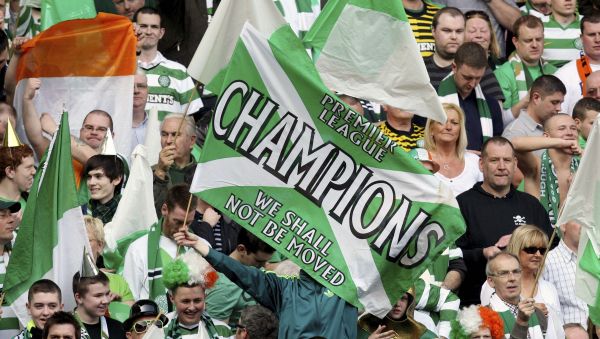  This Sunday, March 25, 2012 file photo shows a general view of Celtic's supporter's during the Scottish Premier League soccer match between Rangers and Celtic at Ibrox, Glasgow, Scotland. Chaos is engulfing Scotland's attempts to deliver a resolution to the season and it might prove to a warning sign to other European leagues weighing up how to conclude a pandemic-affected campaign. The Scottish Professional Football League has on Tuesday, April 14, 2020 asked all 42 clubs in its league system to vote on whether to cancel the season and for final placings to be determined by the points per game of each club. - Sputnik International